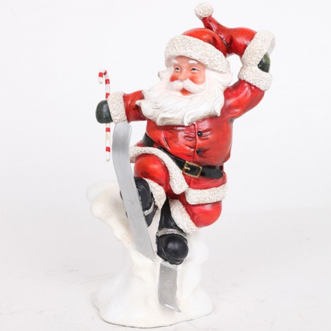 Statue père noël en résine skis et canne 35 cm