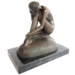 Statue en bronze femme sur coussin - 19 cm